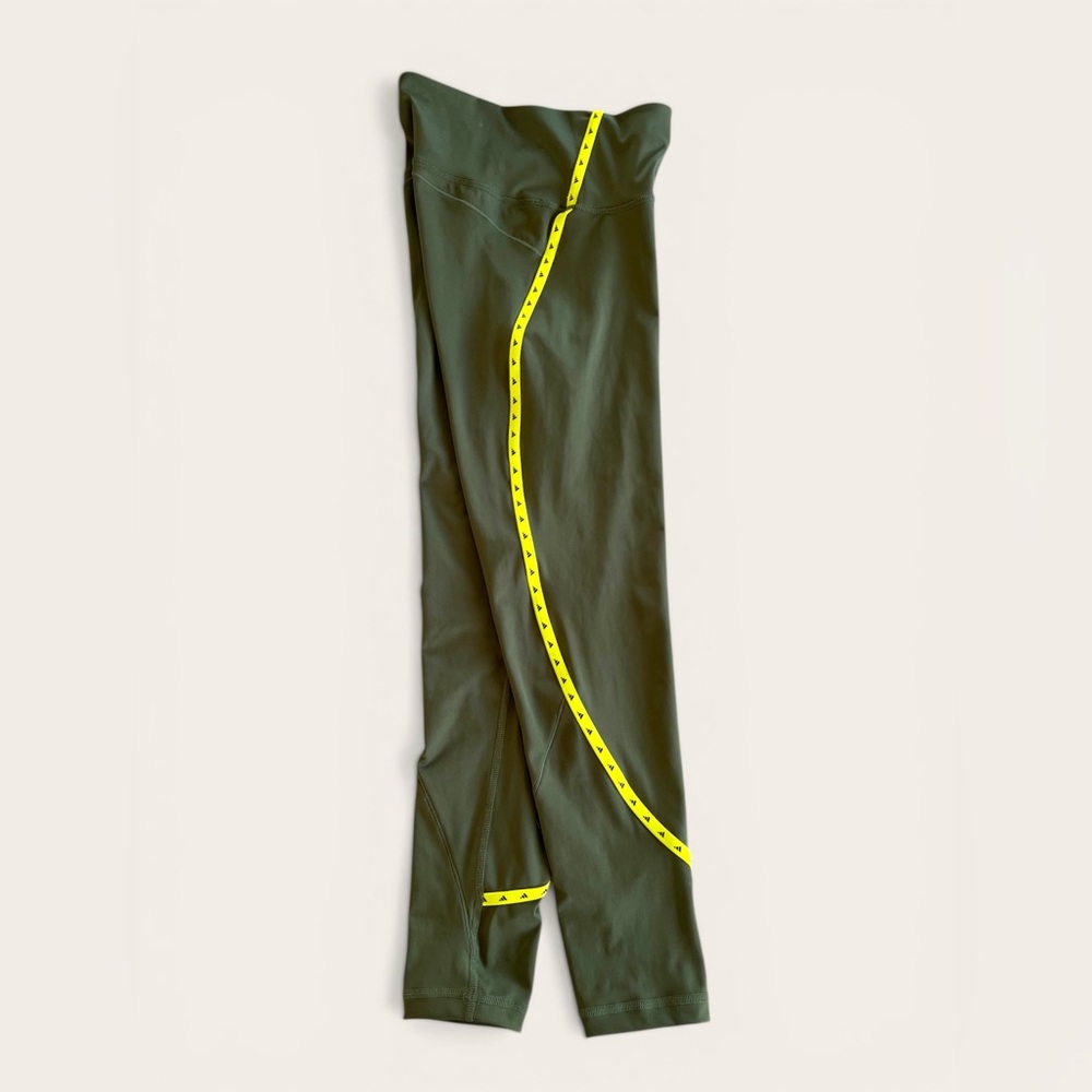 Adidas 23" crop leggings, size small, olive green yellow stripe embellishment